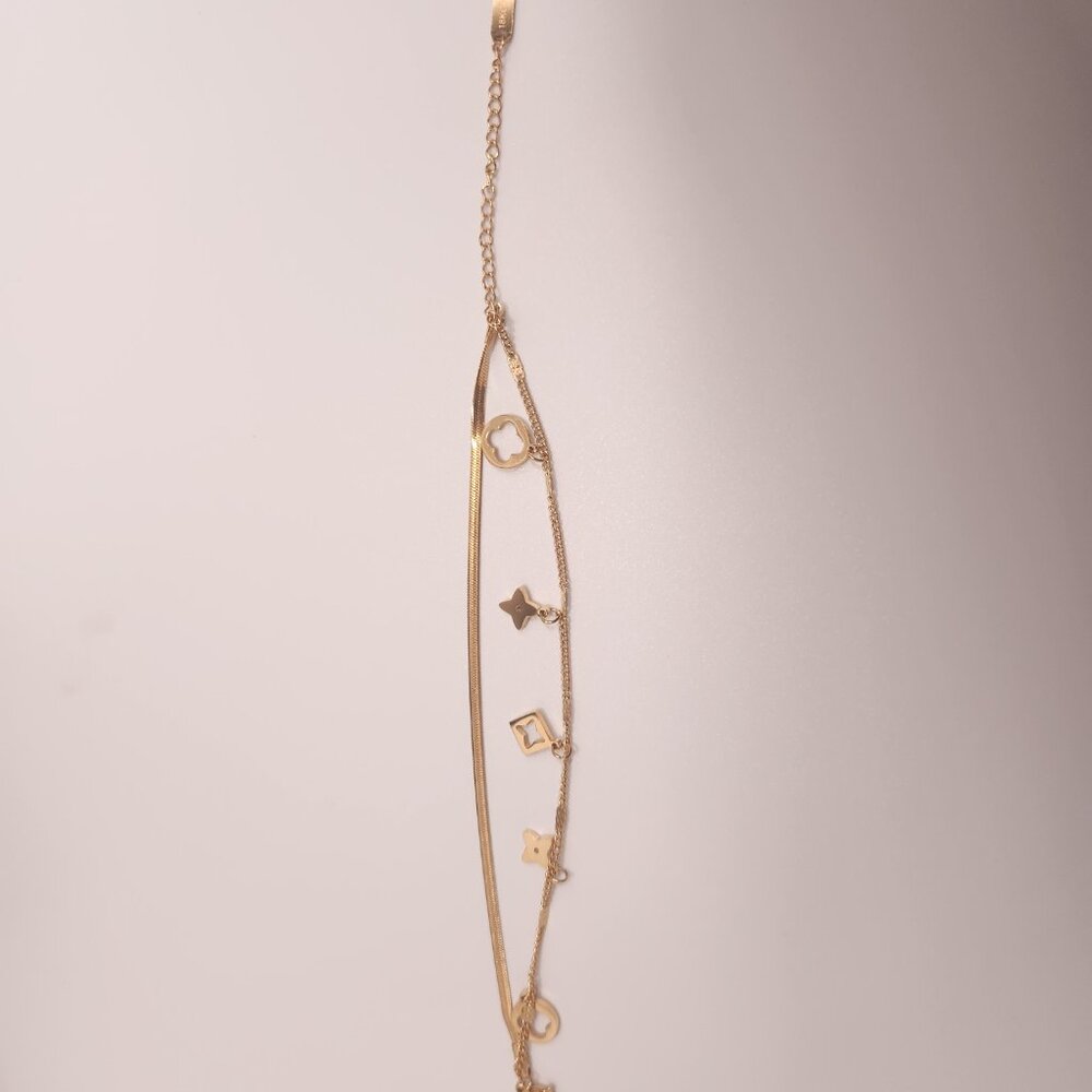 New double strand designer inspired flower and clover bracelet gold plated 18K